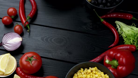 Food Background on Rustic Metal Backdrop with Red Pepper Herbs and Spices Top View