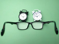 Black and white alarm clock and glasses - PhotoDune Item for Sale