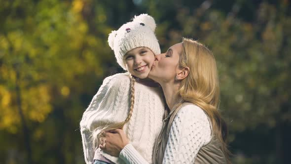Mother Kissing Daughter, Sweet Moments Together, Happy Childhood, Motherhood
