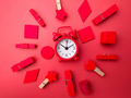 Colored wooden clips and wooden pieces with red alarm clock - PhotoDune Item for Sale