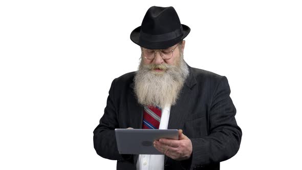 Old Bearded Businessman Using Digital Tablet