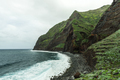 Volcanic beach and cliffs in Madeira Island. Atlantic ocean waves and rocky beach - PhotoDune Item for Sale