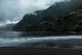Famous volcanic black sand beach in Seixal, Madeira at dramatic cloudy weather - PhotoDune Item for Sale