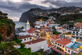 Cityscape of Camara de Lobos at dusk illuminated architecture of the seaside town in Madeira island - PhotoDune Item for Sale