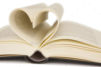 Open book with heart shaped pages. Love for reading