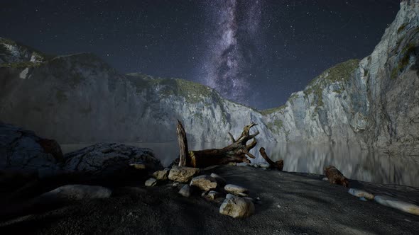 Hyperlapse of Night Starry Sky with Mountain and Ocean Beach in Lofoten Norway