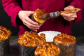 Pastry chef decorates freshly baked Easter cake with sugar syrup - PhotoDune Item for Sale