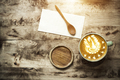 Latte coffee cup and spoon on wood table in cafe with free copy space. - PhotoDune Item for Sale