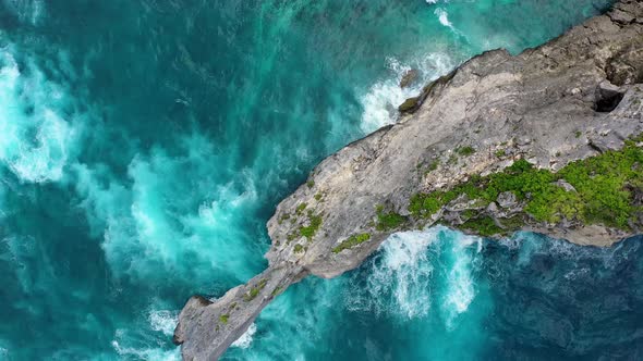 Aerial view at sea and rocks. Nusa Penida, Bali, Indonesia. Seascape from air