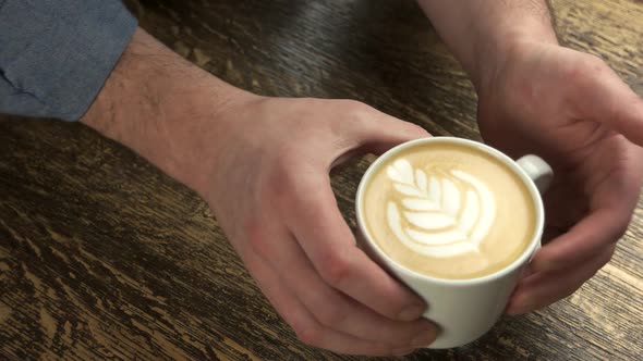 Hands of Man and Latte