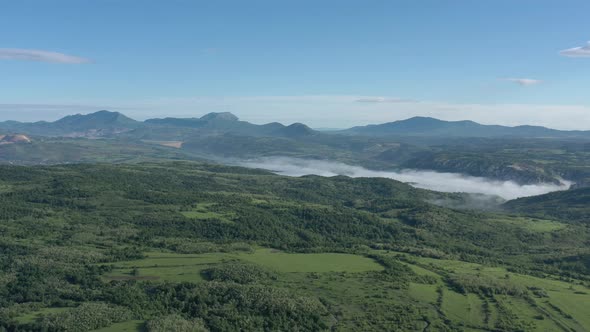 Stol Deli Jovan and Veliki Krs mountains under blue sky 4K drone footage