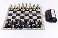 Chessboard with black and white pieces on a white background - PhotoDune Item for Sale