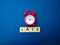 Red alarm clock with the word LATE - PhotoDune Item for Sale