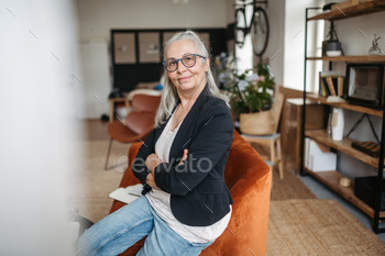 Portrait of senior woman with busines look.