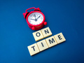 Red alarm clock with the  ON TIME - PhotoDune Item for Sale
