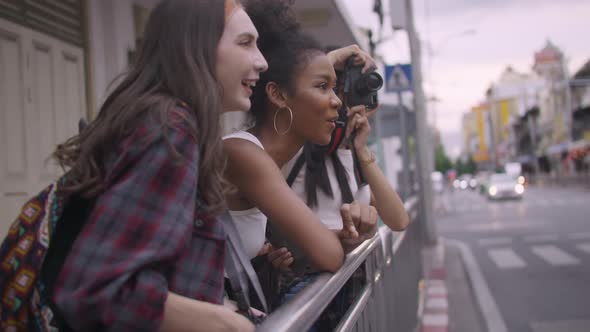 A group of multi-ethnic female friends enjoying the city tour.