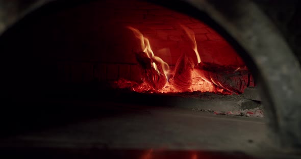 Fire Burn Wood Super Slow Motion. Ready to prepare Italian Pizza. Kitchen Oven.