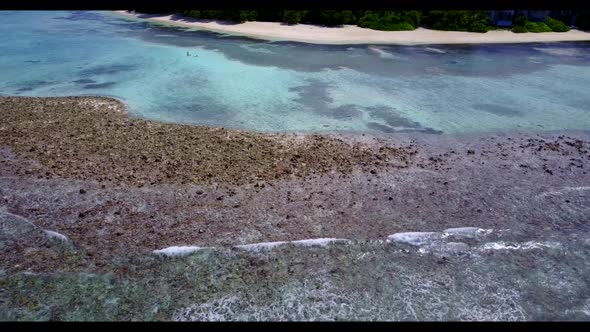 Aerial top down nature of exotic lagoon beach trip by aqua blue lagoon and clean sandy background of