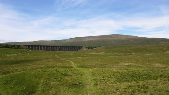 Ribblehead or Batty Moss Viaduct, Yorkshire Dales National Park, England. Aerial rising