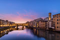 Florence, Italy at the Ponte Vecchio Bridge crossing the Arno River - PhotoDune Item for Sale