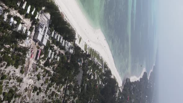 Vertical Video of the Ocean Near the Coast of Zanzibar Tanzania Aerial View