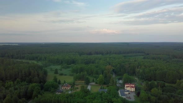 Flight Over Forest and House in Forest