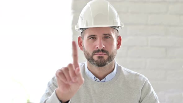 Portrait of Young Engineer Showing No Sign By Finger