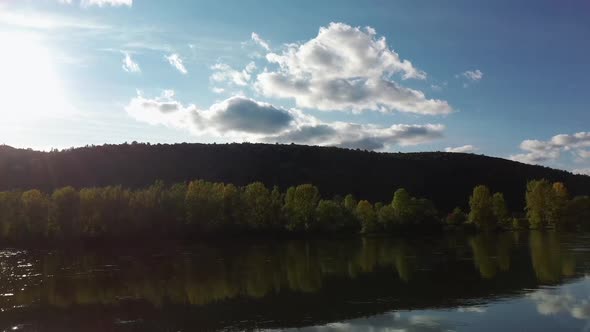 Beautiful Calm Mountain River in Autumn at Sunset on a Warm Evening