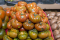 A pile of tomatoes on a table - PhotoDune Item for Sale