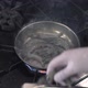 Man Puts Royal Shrimps Into Frying Pan in Seafood Restaurant - VideoHive Item for Sale
