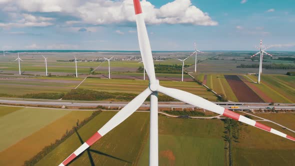 Aerial View of Wind Turbines Farm in Field. Austria. Drone View on Energy Production