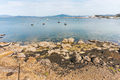 Rocky shore with small fishing boats - PhotoDune Item for Sale