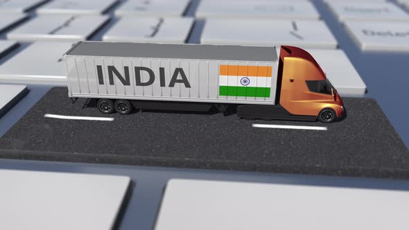 Flag of India on Moving Truck and Computer Keyboard