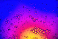 Colorful background with water and oil drops and a yellow and blue background - PhotoDune Item for Sale