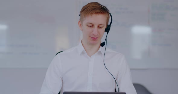 Helpdesk Support Man Talking on Headset Video Conference