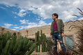 Man visiting the old rustic model school with cactus in Mineral de Pozos Guanajuato Mexico - PhotoDune Item for Sale