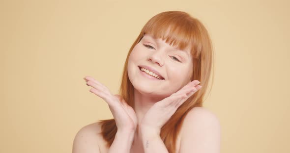 Woman with Ginger Hair Shows Face Cleaned From Pimples