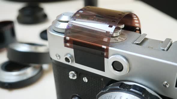 Retro Photo Camera with Photographic Film and Lens