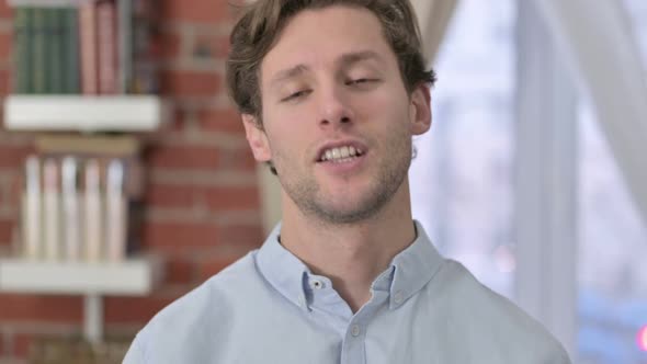 Portrait of Young Man Doing Video Chat