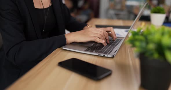 Hands typing on keyboard laptop / Videohive