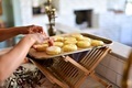 woman neatly placing fresh round cut biscuit dough on a baking sheet - PhotoDune Item for Sale