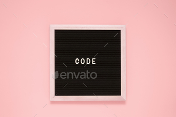 White color letter in word code on black felt board background.