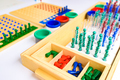 Detail of pins and beans on a montessori board to perform mathematical divisions. - PhotoDune Item for Sale