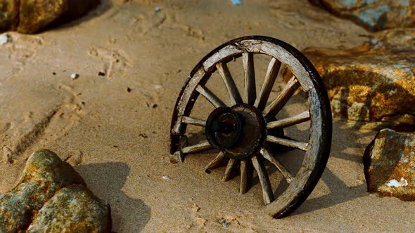 Old Wooden Cart Wheel at Sand Beach