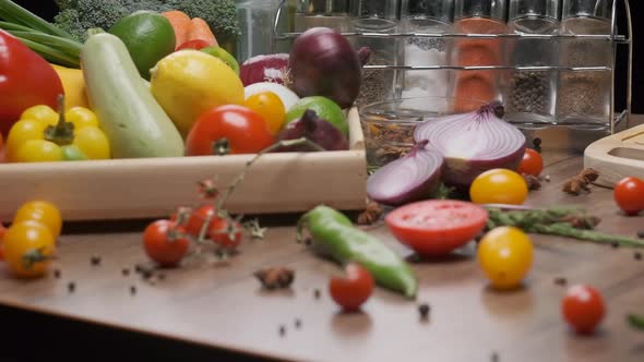 Fresh Whole and Sliced Vegetables on the Table