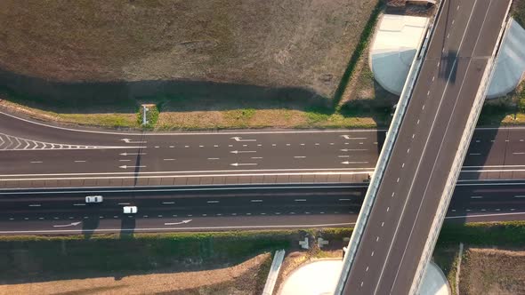 Top View of Road and Bridge with Moving Cars