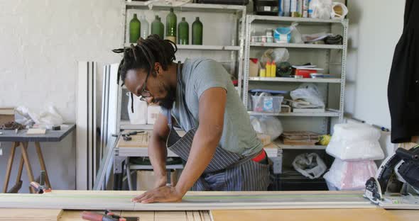 Carpenter working in the workshop 4k