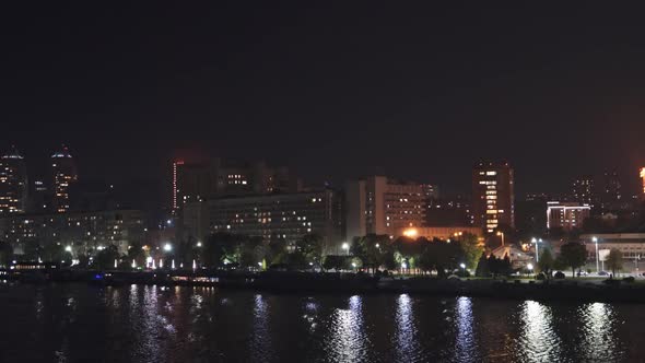 Big Beautiful Dnieper River in the Huge Night Bright City of Dnipropetrovsk in Ukraine