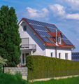 Innovative House with solar collectors- building modified by image editing - PhotoDune Item for Sale