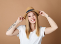 Portrait of pretty young woman with hat - PhotoDune Item for Sale